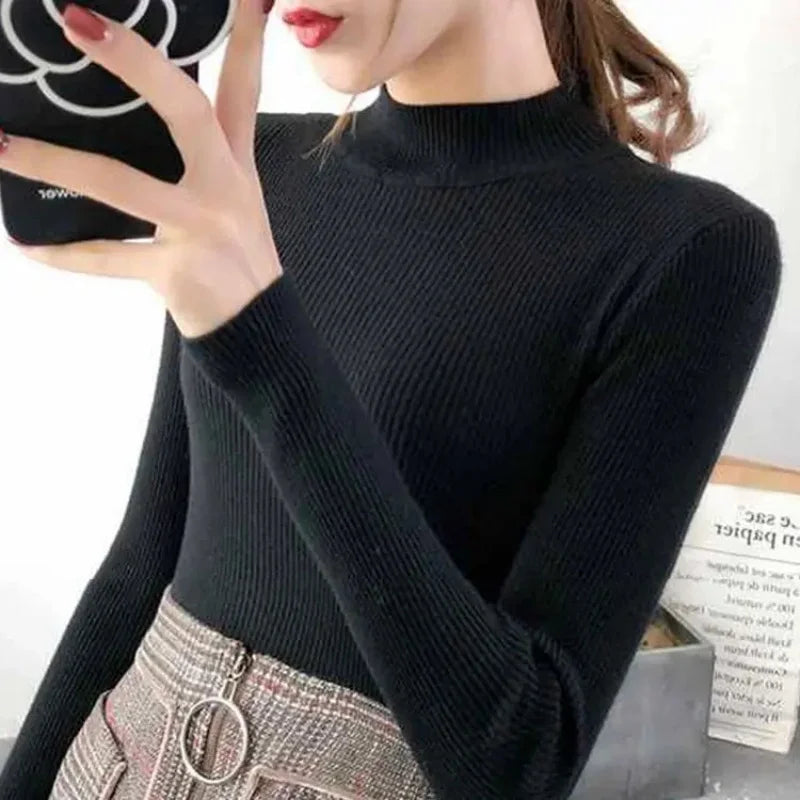 KnitAura Sweater: Slim mock neck knit with vintage charm and cozy elegance.