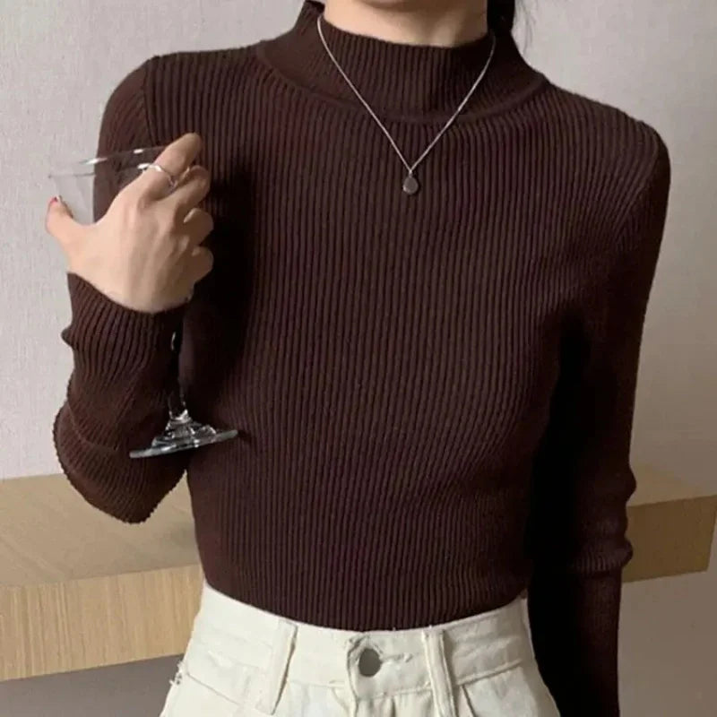 KnitAura Sweater: Slim mock neck knit with vintage charm and cozy elegance.
