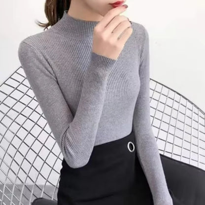 KnitAura Sweater: Slim mock neck knit with vintage charm and cozy elegance.
